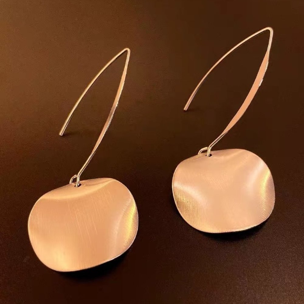 Large metal disc earrings